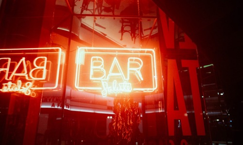 A dimly lit, classic bar with a welcoming atmosphere - local bars near me A dimly lit, classic bar with a welcoming atmosphere - local bars near me