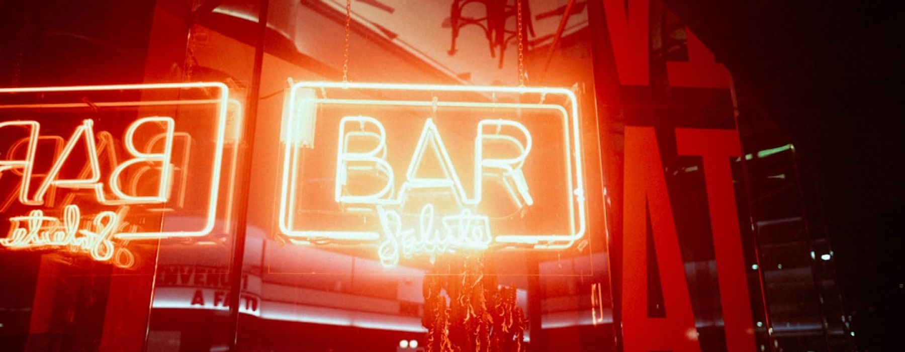 A dimly lit, classic bar with a welcoming atmosphere - local bars near me